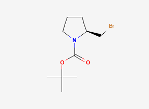 Two-dimensional chemical structure of tert-butyl (2S)-2-(bromomethyl)pyrrolidine-1-carboxylate