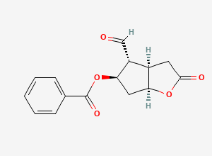 Two-dimensional chemical structure of (3aR,4R,5R,6aS)-4-formyl-2-oxohexahydro-2H-cyclopenta[b]furan-5-yl benzoate
