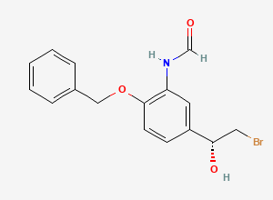 Two-dimensional chemical structure of (R)-N-[5-(2-Bromo-1-hydroxyethyl)-2-(phenylmethoxy)phenyl]formamide