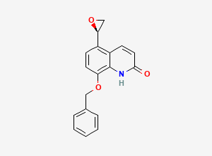 Two-dimensional chemical structure of 5-(2R)-2-Oxiranyl-8-(phenylmethoxy)-2(1H)-quinolinone