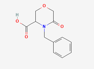 Two-dimensional chemical structure of 4-Benzyl-5-oxomorpholine-3-carboxylic acid