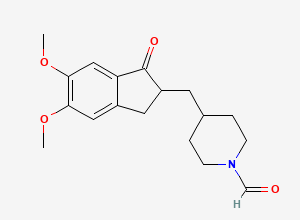 Two-dimensional chemical structure of 4-((5,6-dimethoxy-1-oxo-2,3-dihydro-1H-inden-2-yl)methyl)piperidine-1-carbaldehyde, CAS 1808997-65-0