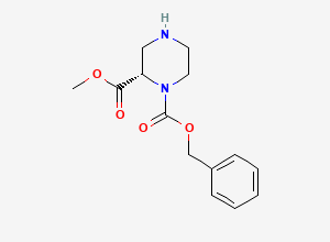 Two-dimensional chemical structure of 1-Benzyl 2-methyl (2S)-piperazine-1,2-dicarboxylate