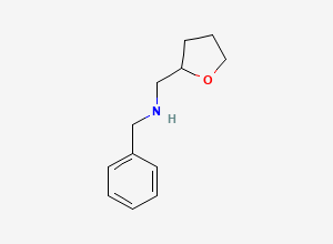 Two-dimensional chemical structure of N-Benzyl-1-(oxolan-2-yl)methanamine