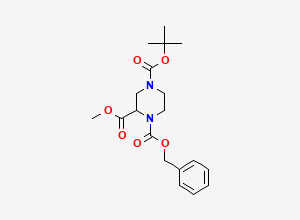 Two-dimensional chemical structure of 1-Benzyl 4-tert-butyl 2-methyl piperazine-1,2,4-tricarboxylate