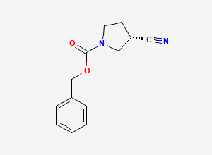 Two-dimensional chemical structure of (S)-Benzyl 3-cyanopyrrolidine-1-carboxylate