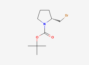 Two-dimensional chemical structure of tert-Butyl (2R)-2-(bromomethyl)pyrrolidine-1-carboxylate