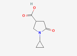 Two-dimensional chemical structure of 1-Cyclopropyl-5-oxopyrrolidine-3-carboxylic acid