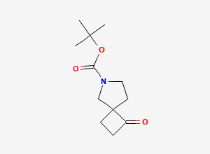 Two-dimensional chemical structure of tert-Butyl 1-oxo-6-azaspiro[3.4]octane-6-carboxylate