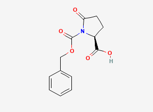 Two-dimensional chemical structure of 1-(Phenylmethyl) (2S)-5-oxo-1,2-pyrrolidinedicarboxylate