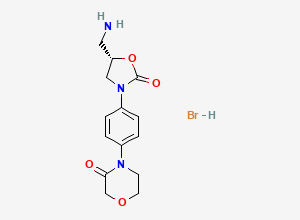 Two-dimensional chemical structure of (S)-4-(4-(5-(aminomethyl)-2-oxooxazolidin-3-yl)phenyl)morpholin-3-one hydrobromide